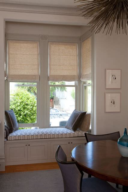 Motorized Roman Shades In A Bay Window And Built In Window Seat