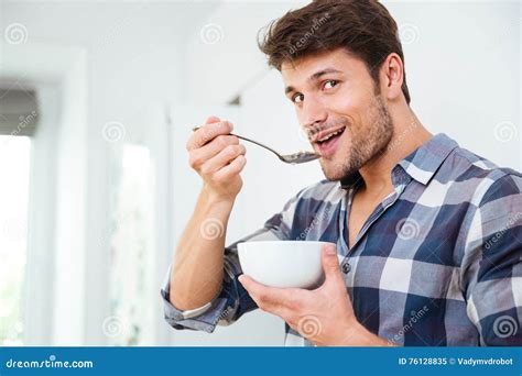 Man Eating Cereals With Milk For Breakfast On The Kitchen Stock Image Image Of Abode Happy