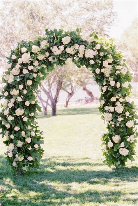 26 Floral Arches That Will Make You Say I Do Wedding Arch Floral