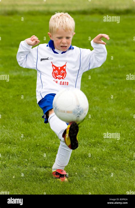 Boy Boys Kicking A Ball Hi Res Stock Photography And Images Alamy
