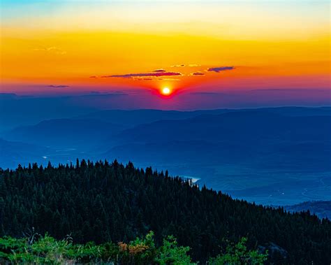 Download Wallpaper 1280x1024 Sun Sunset Trees Mountains Landscape