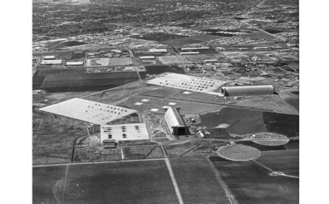 Firefighters Battle Blaze At Historic Former Marine Corps Hangar In