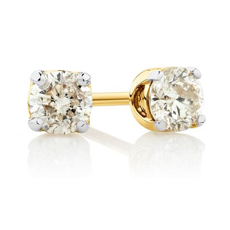 Carat, color, clarity, cut are 4 c's. Stud Earrings with 0.30 Carat TW of Diamonds in 10ct ...
