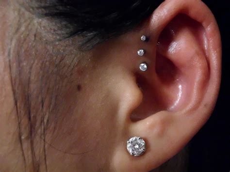 The earrings are handcrafted using 14k yellow solid gold. triple forward helix piercing | neometal 18g astm f-136 ...