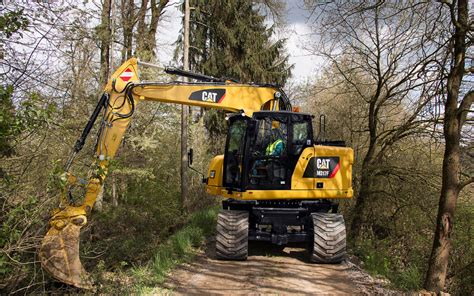 Cat Introduces New M315f And M317f Wheeled Excavators Featuring Low Cost