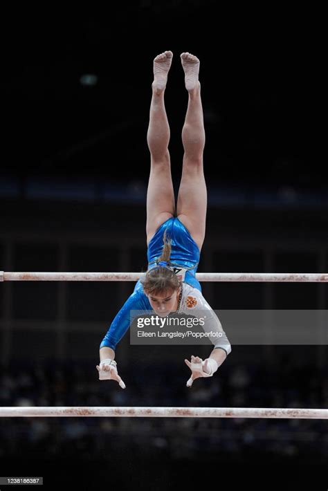 Anastasia Grishina Of Russia Competing On Uneven Bars In The Womens