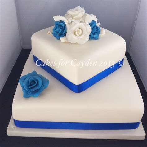 2 Tier Square Ivory And Royal Blues Wedding Cake With Hand Made Sugar