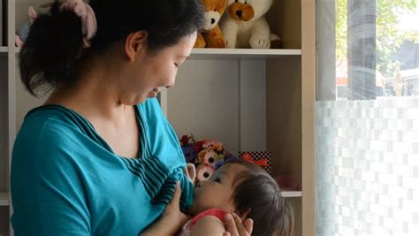 Asian Mother Breastfeeding Her Baby Stock Footage Video 8587414