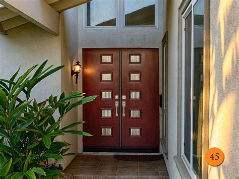 Modern contemporary handles for doors include silver finishes, curves, details and mixed materials. Fiberglass Entry Doors Photo Gallery | Todays Entry Doors ...