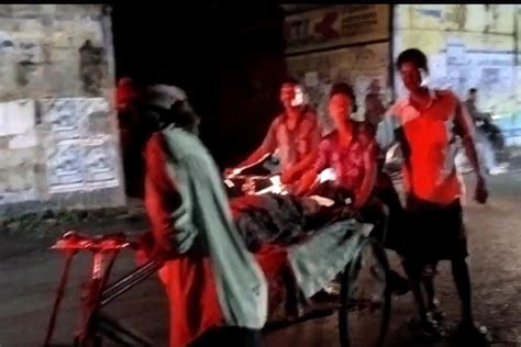 Odisha No Cash For Hearse Tribal Man Carries Wifes Body On Trolley