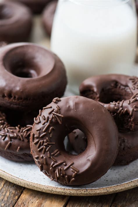 If you're looking for a fun and easy breakfast for the littles come fall, these baked chocolate pumpkin donuts are a yummy option. Chocolate Donuts - easy baked donuts covered in chocolate ...
