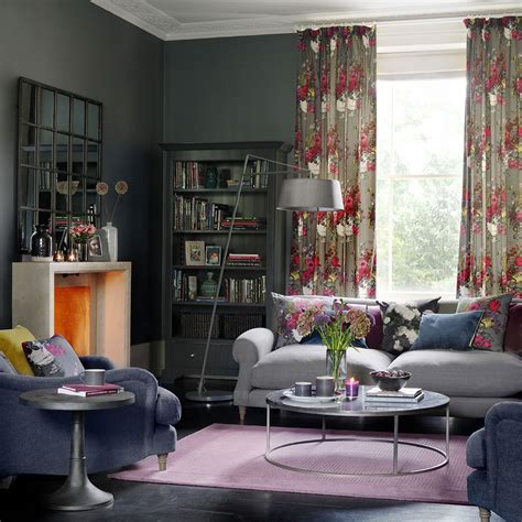 Dark walls accentuate color more than white ever would, so despite their deeper hue, shades like dark grey and navy blue work wonderfully in a colorful living room scheme. 41 grey living room ideas in dove to dark grey for decor inspiration