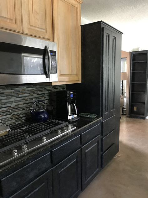J&k cabinets come standard with the greatest features that. These black cabinets pair perfectly with the natural wood ...