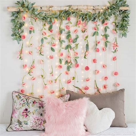 We all covet that space where we can unwind and relax after a long day or stressful week at work and our bedroom should always be. Create a whimsical wall hanging with faux florals for ...