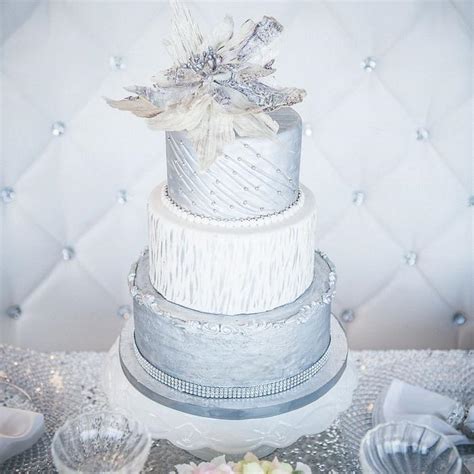 White And Silver Wedding Cake Decorated Cake By Diva Of Cakesdecor