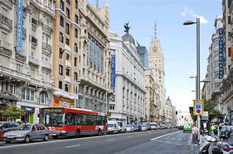 Calle Gran Vía In Madrid Explore Shop And Dine Along One Of Madrids
