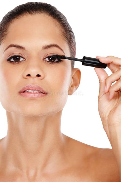 Creating Perfect Lashes Attractive Young Woman Applying Mascara To Her
