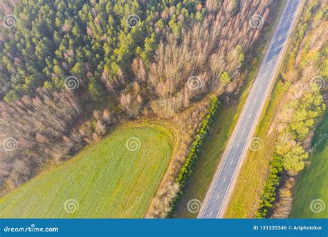 Woodland And Highway In Autumn Rural Aerial Landscape Stock Photo