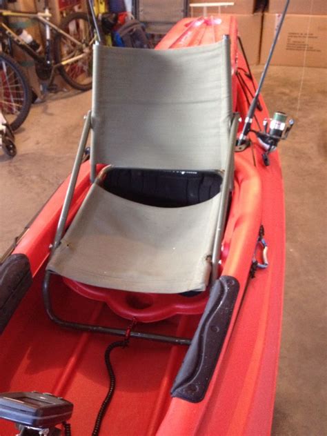 The feelfree gravity kayak seat is unlike any other kayak seat on the market. The seat in place. Nice snug fit. The open clamp on the bottom will clip to the original seat ...