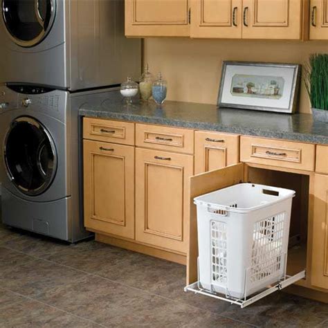 I wanted a pull out hamper with a white plastic laundry basket. Rev-A-Shelf White Pull-Out Polymer Laundry Hamper for ...