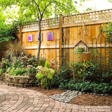 They have two cats they allow outdoors each morning and only return home at nighttime. Backyard Landscaping Ideas for Privacy | Better Homes and ...