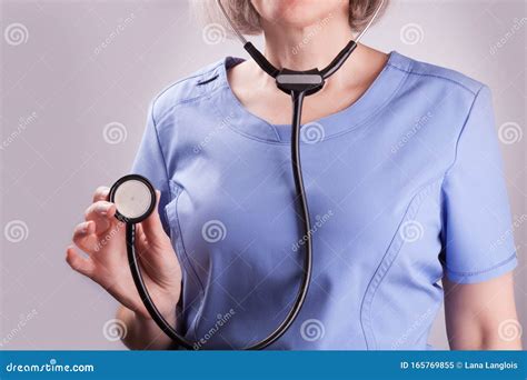 Closeup On A Nurse Holding A Stethoscope Stock Image Image Of Beat