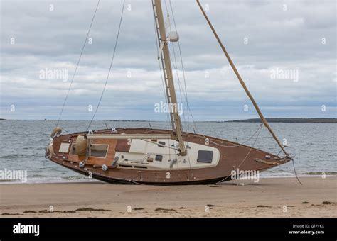 Beached Sailboat Stock Photo Royalty Free Image 104227870 Alamy