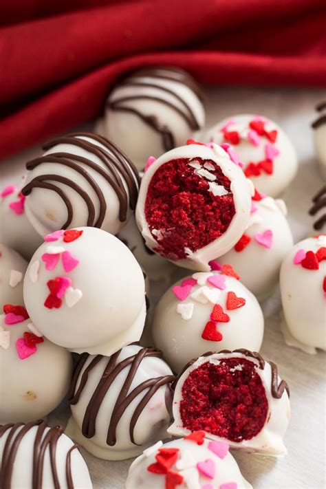 These Red Velvet Cake Balls Are Dipped In White Chocolate And Are