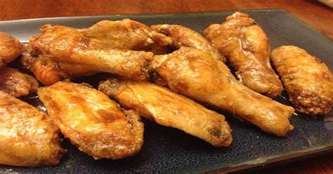 Heat cooking oil in a pan about an inch deep and fry the chicken popcorn until golden brown and crispy. Filipino-style Crispy Chicken Wings Recipe | Panlasang ...