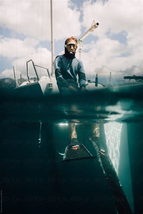 Diver Preparing For A Dive By Stocksy Contributor Boris Jovanovic