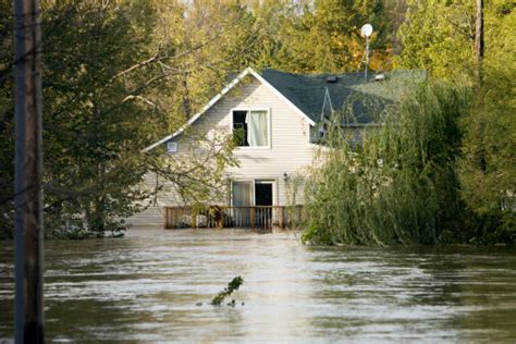 Flooded House Following A Severe Rainstorm Stock Photo Download Image