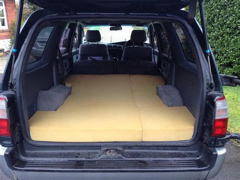 A couple of weeks ago i built a bed kit for my runner with just a few parts from home depot and some scraps i had lying around. Easy rear sleeping setup... - Toyota 4Runner Forum - Largest 4Runner Forum