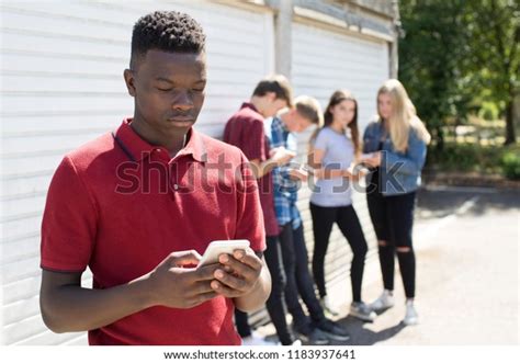Teenage Boy Being Bullied By Text Stock Photo Edit Now 1183937641