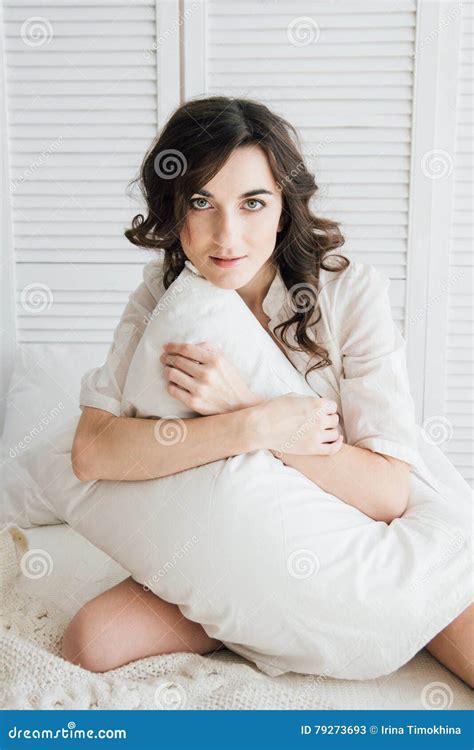 Woman In Underwear Sitting On The Bed Hugging A Pillow Stock Image Image Of Lifestyle