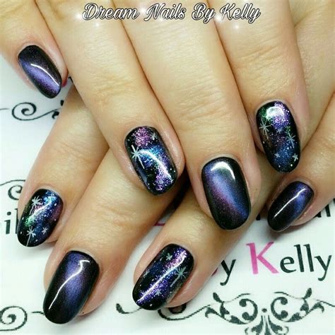 Cat eye nail polish is very easy to apply and absorb, and can easily complete nail art design creation at home. Purple cat eye gel polish with freehand nail art. | Cat ...