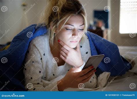 Disappointed Sad Woman Holding Mobile Phone While Laying On Bed Stock Image Image Of Mobile