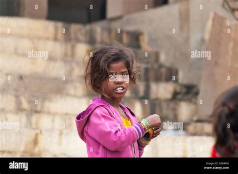 Unidentified Indian Young Girl On The Ghat In Varanasi Uttar Pradesh