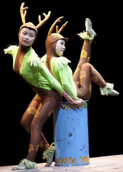 New Shanghai Circus Performs Traditional Chinese Acrobatics Orange