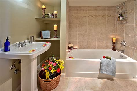 A bathroom remodel may include demolishing the area, installing new flooring, hardware, bathtub, toilet, shower, cabinets, sink, countertops, mirror, tiling a tub and shower surround, connecting plumbing, and painting walls. Bathroom Remodel Ideas | Corvus Construction