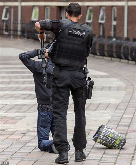 dramatic moment armed police screaming get down arrest man suspected of weapons offences