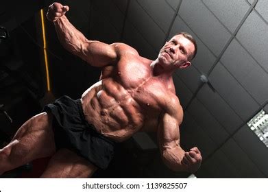 Mature Bodybuilder Naked Torso Showing Sixpack Stock Photo