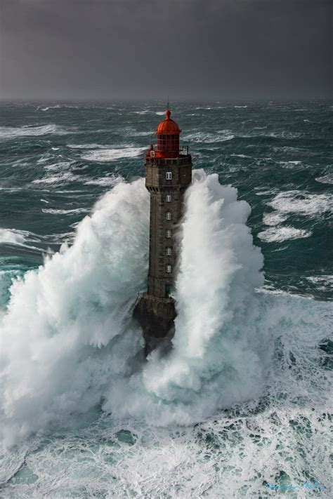La Jument Lighthouse Midst The Stormy Sea Credit Ronan