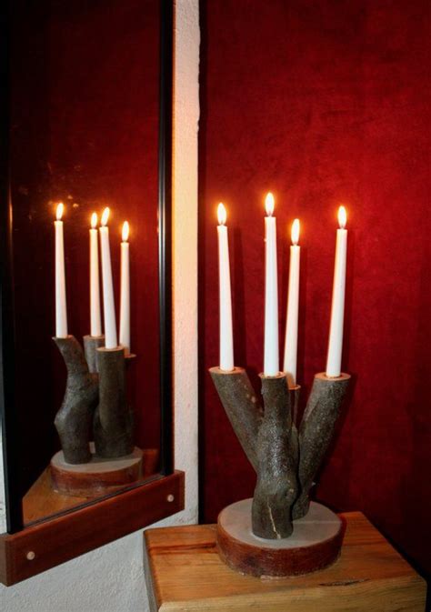 This diy version in wood is an easily constructed before you drill into the wood, measure some taper candles to determine how big you should make the hole. Advent wreath candle holder. Double branched table ...