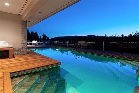 Features of this amazing pool include a 14 seat whirlpool, shallow pool, waterfall and a water slide. Indoor/Outdoor Pool in West Vancouver #blurrdMEDIA | Cool ...