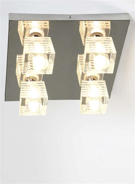 Say goodbye to builder basic and hello to overhead lighting that shines. Chrome Aquila 4 light ceiling light - Flush Fitting ...