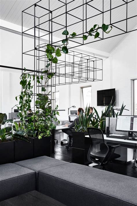 One of the factors that can improve the quality of work is the workplace itself. Candlefox HQ: A Graphic, Black and White Office in ...