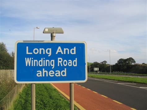 Long And Winding Road Ahead Sign By Pudgemountain On