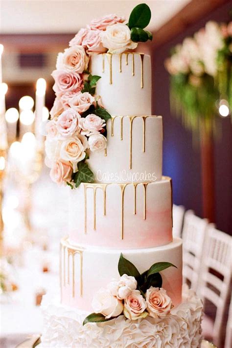 This chocolate drip wedding cake almost looks too good to eat, don't you think? Top 5 Trends for Wedding Cakes in 2017 - Oh Best Day Ever