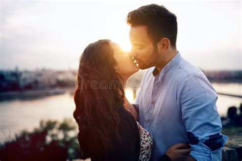 Romantic Couple Cuddling And Kissing Outdoors Stock Image Image Of