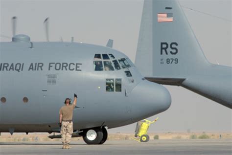 A Us Air Force C 130 Hercules Crew Chief Gives The